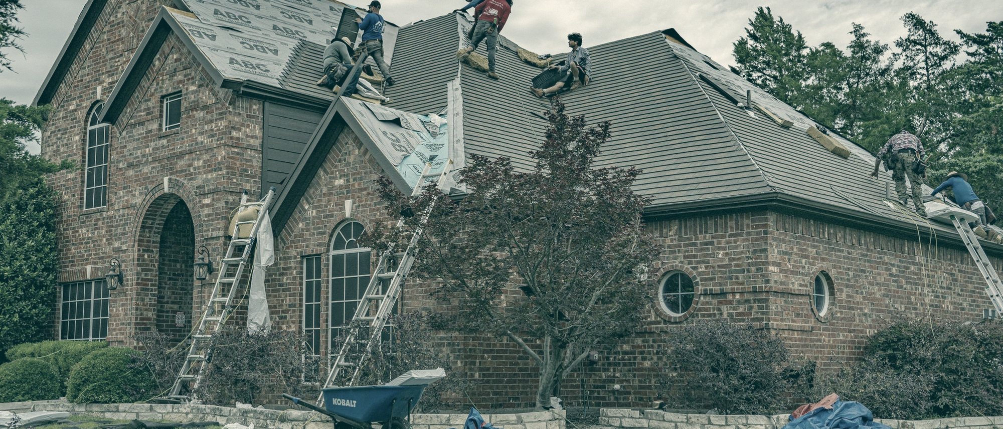 People at work in a roofing company
